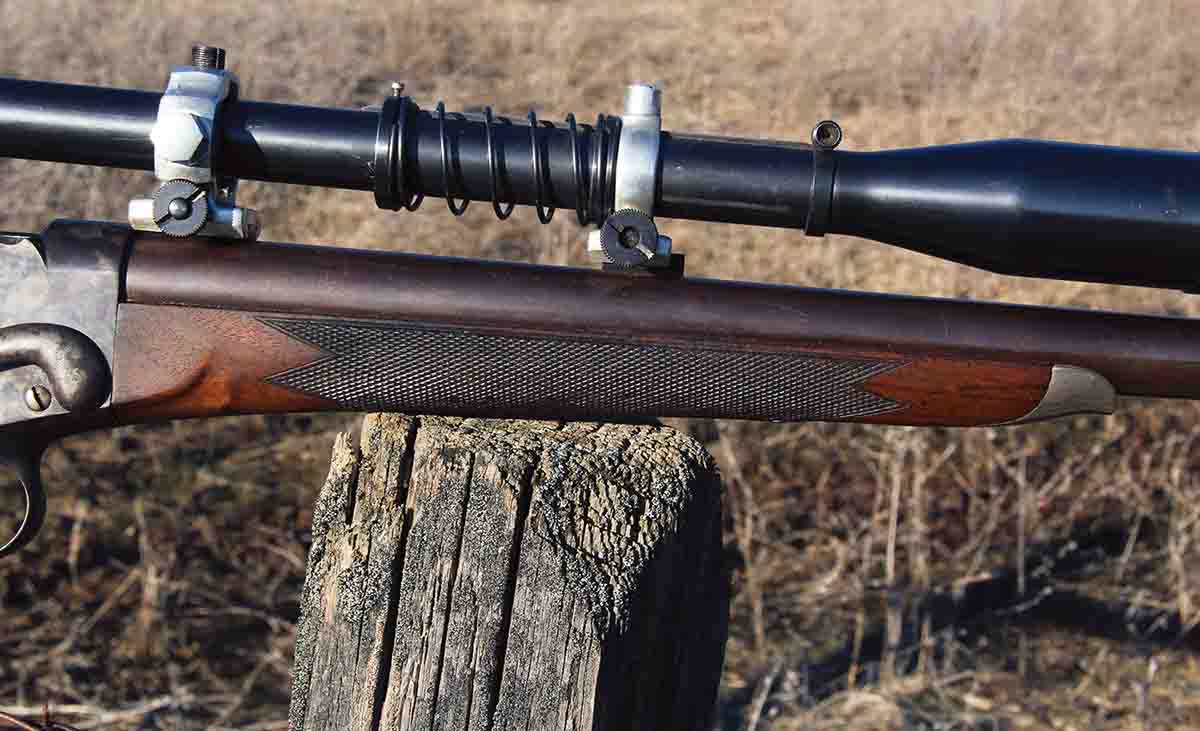 The fine walnut buttstock and the slim forend included fine hand-checkering that was still well defined for a 130-some-year-old-rifle.